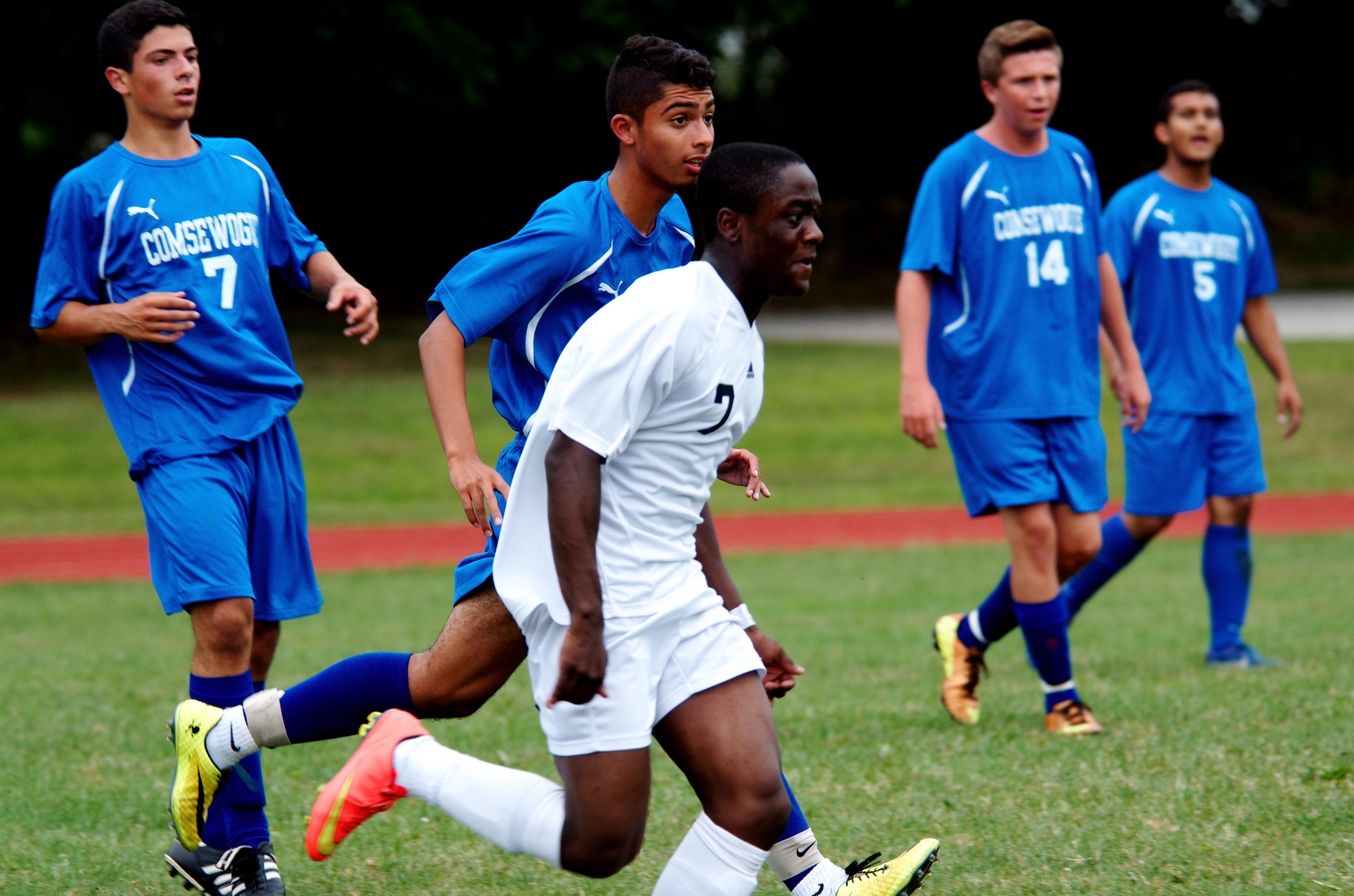 Agyei-Gyamfi charges toward a ball earlier this season v. Comsewogue