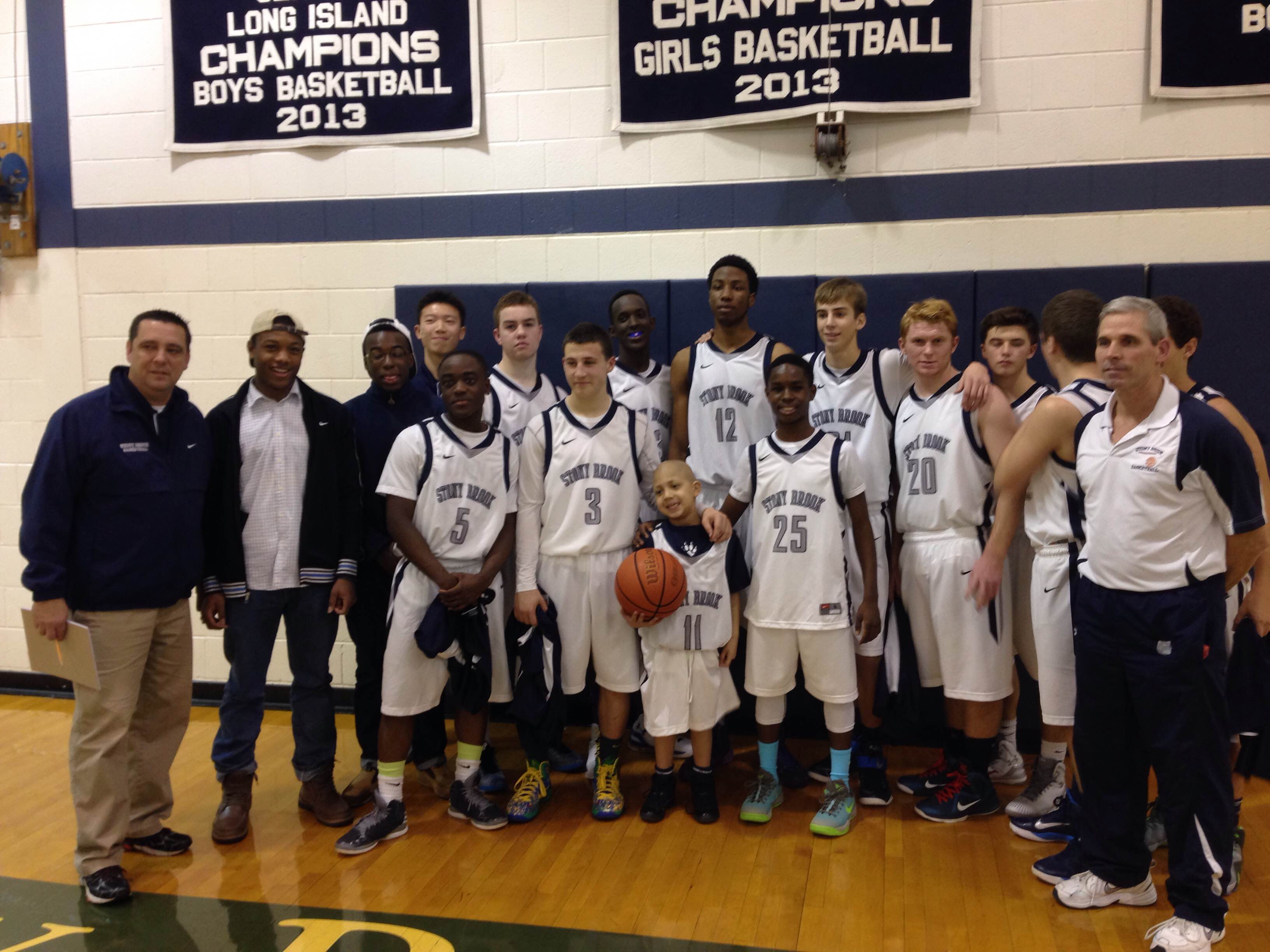 AJ (#11) poses with the squad after the game