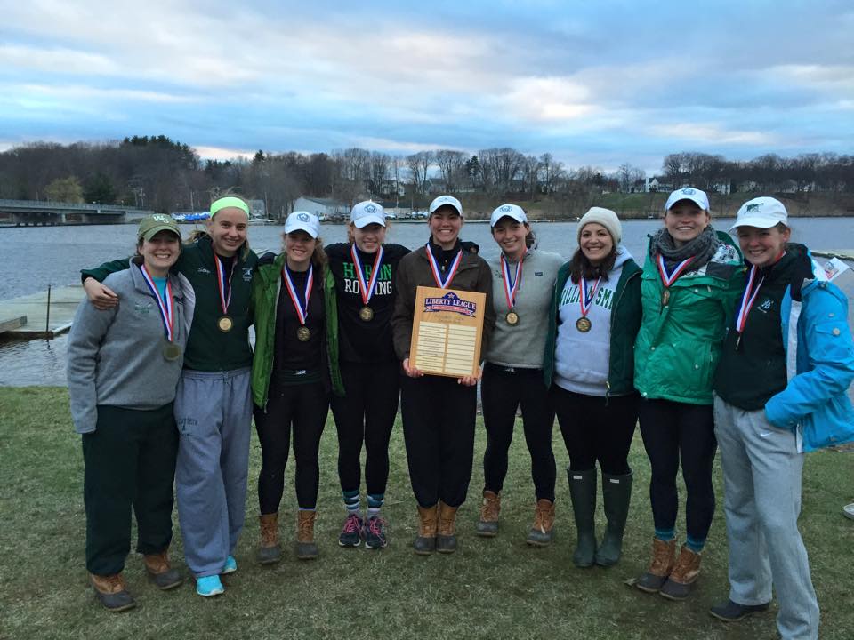 Andersen (center) and her fellow seniors celebrate the Liberty League title